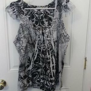 Sleeveless ruffled caps blouse